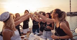 Women cheering glasses